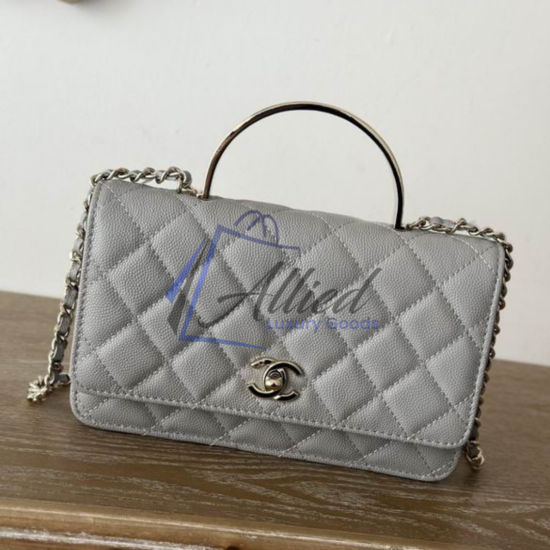 Chanel Classic Flap Clutch with Chain | Timeless Compact Luxury