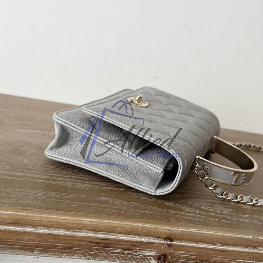Chanel Classic Flap Clutch with Chain | Timeless Compact Luxury