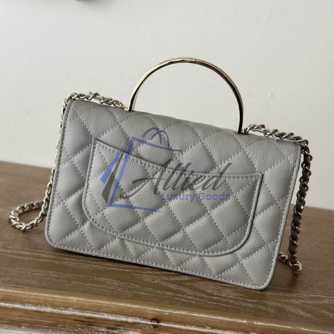 Chanel Classic Flap Clutch with Chain | Timeless Compact Luxury