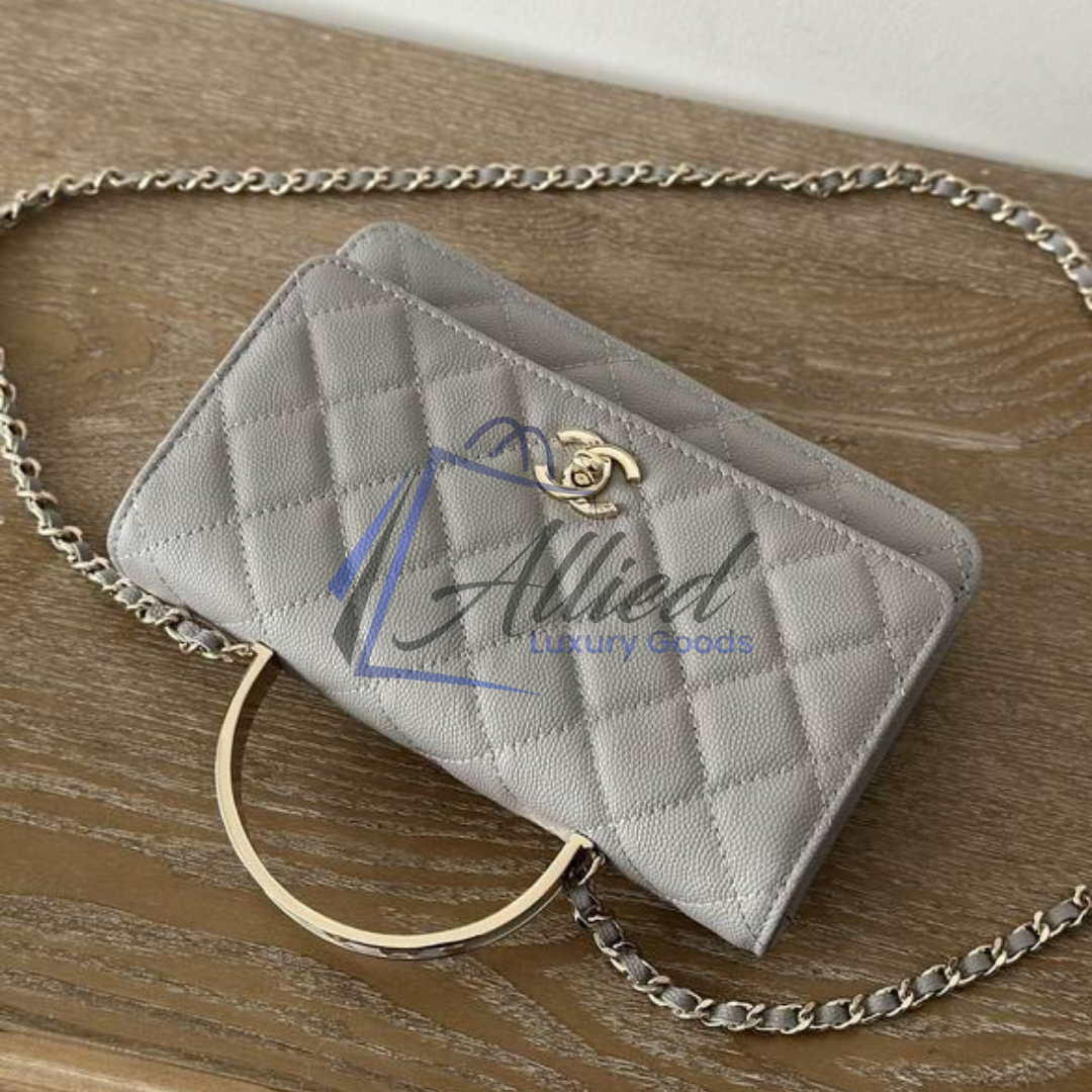 Chanel Classic Flap Clutch with Chain | Timeless Compact Luxury