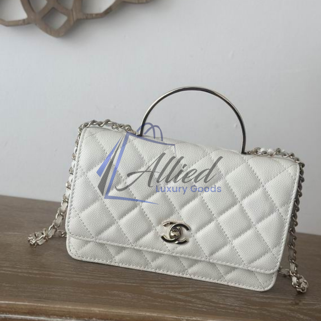 Chanel Classic Flap Clutch with Chain | Timeless Compact Luxury