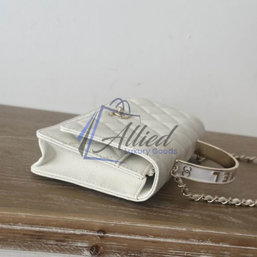 Chanel Classic Flap Clutch with Chain | Timeless Compact Luxury