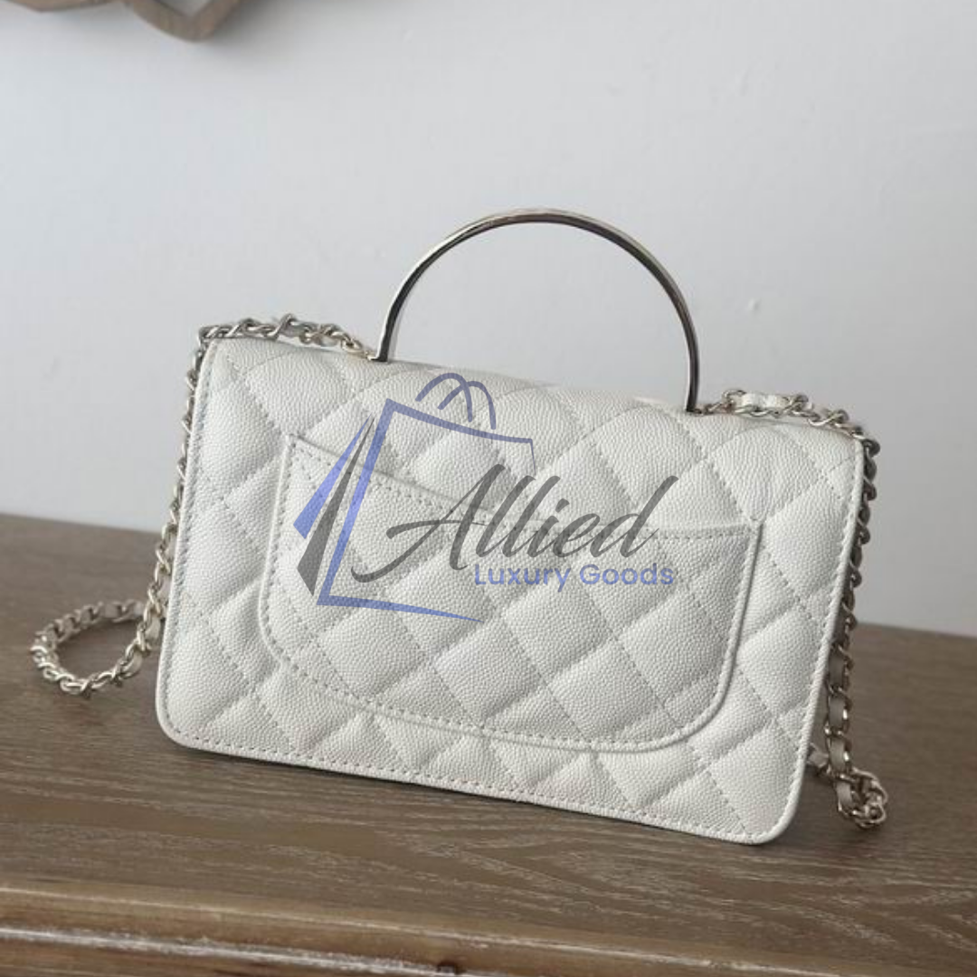 Chanel Classic Flap Clutch with Chain | Timeless Compact Luxury