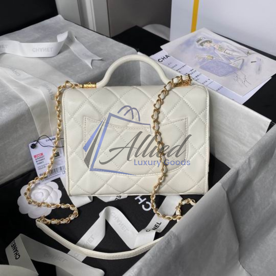 Chanel Maxi Classic Flap Bag with Top Handle | Heirloom Luxury Redefined