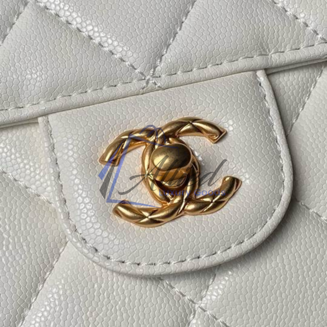Chanel Maxi Classic Flap Bag with Top Handle | Heirloom Luxury Redefined