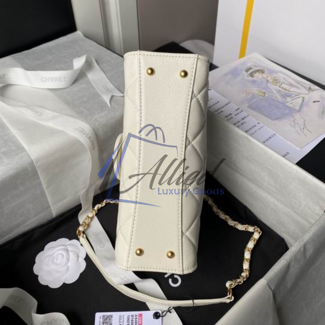 Chanel Maxi Classic Flap Bag with Top Handle | Heirloom Luxury Redefined