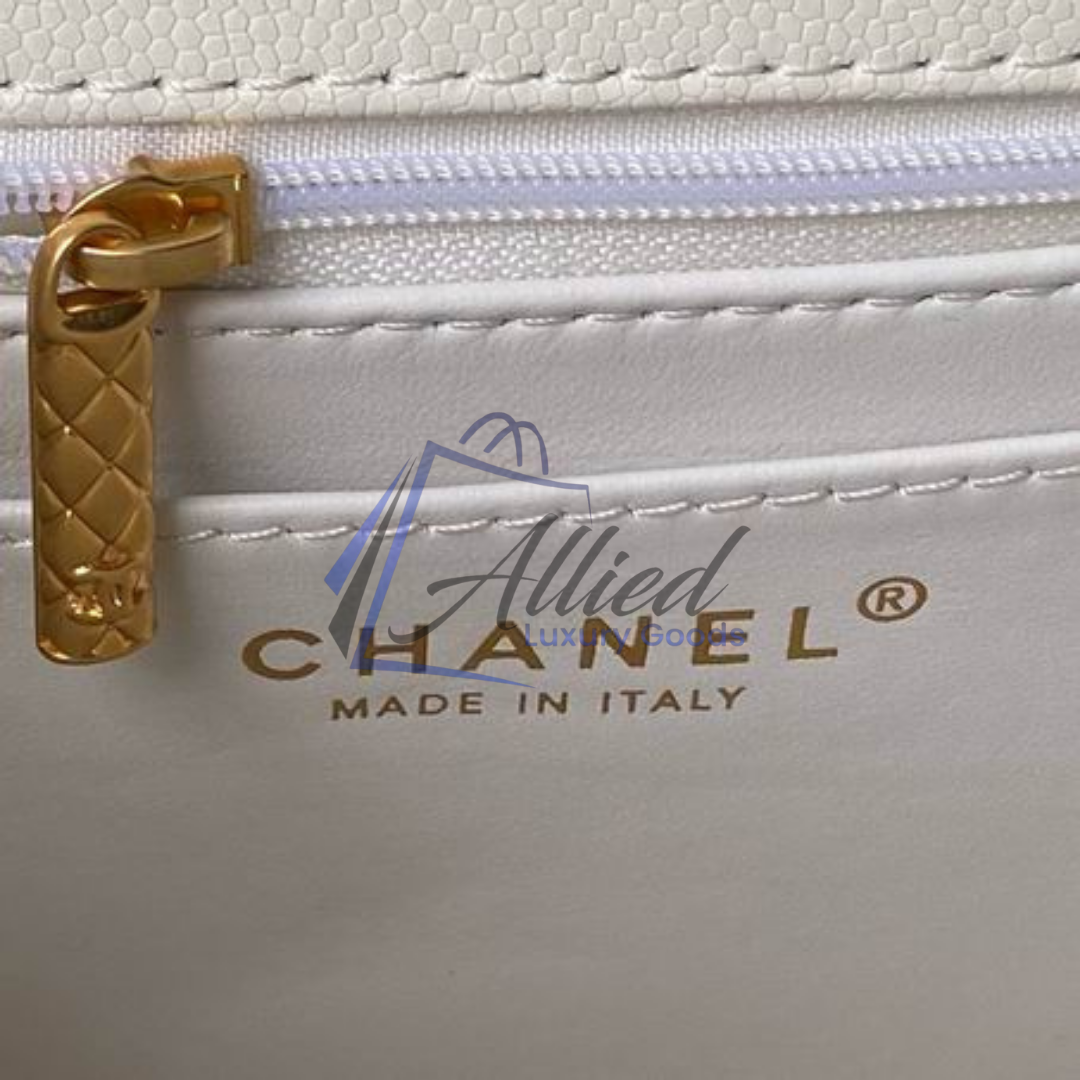 Chanel Maxi Classic Flap Bag with Top Handle | Heirloom Luxury Redefined