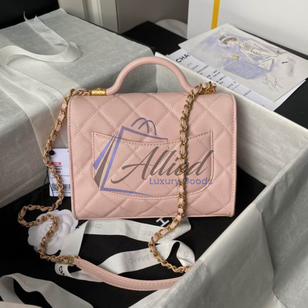 Chanel Maxi Classic Flap Bag with Top Handle | Heirloom Luxury Redefined