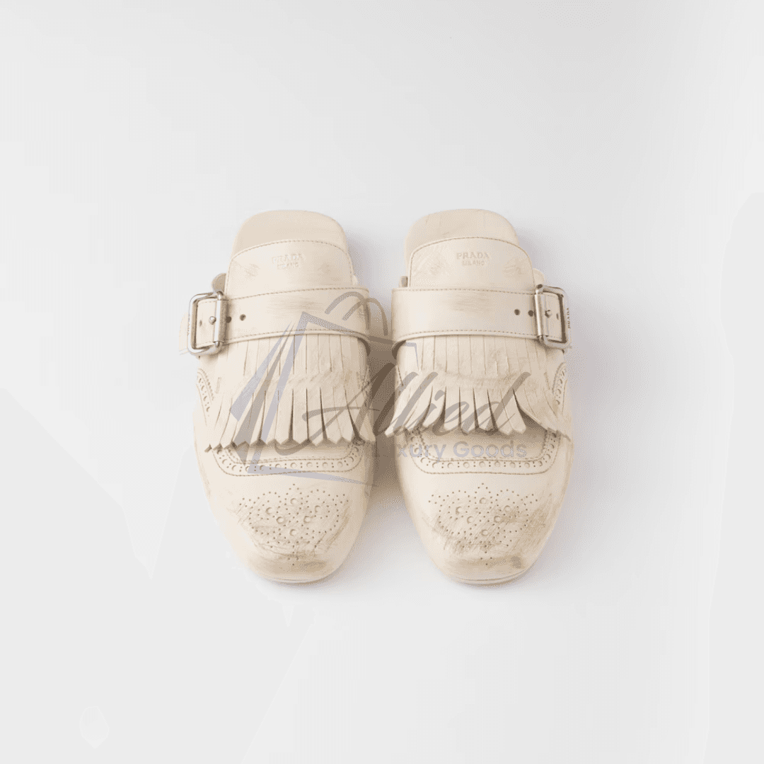 Prada Shuffle Fringed Leather Mules