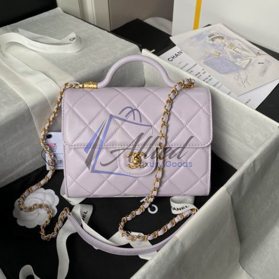 Chanel Maxi Classic Flap Bag with Top Handle | Heirloom Luxury Redefined