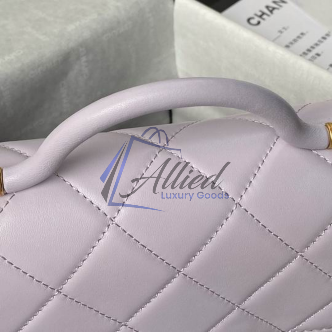 Chanel Maxi Classic Flap Bag with Top Handle | Heirloom Luxury Redefined