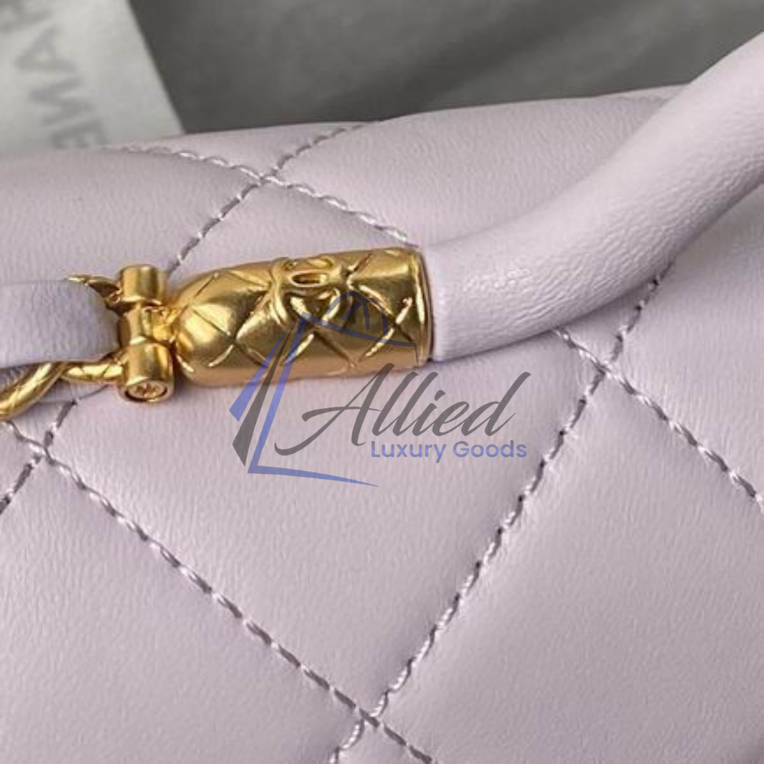 Chanel Maxi Classic Flap Bag with Top Handle | Heirloom Luxury Redefined