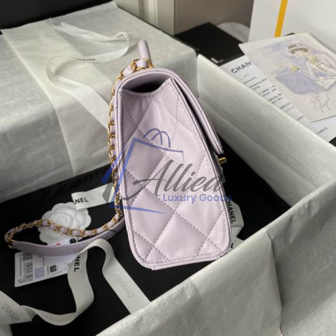 Chanel Maxi Classic Flap Bag with Top Handle | Heirloom Luxury Redefined