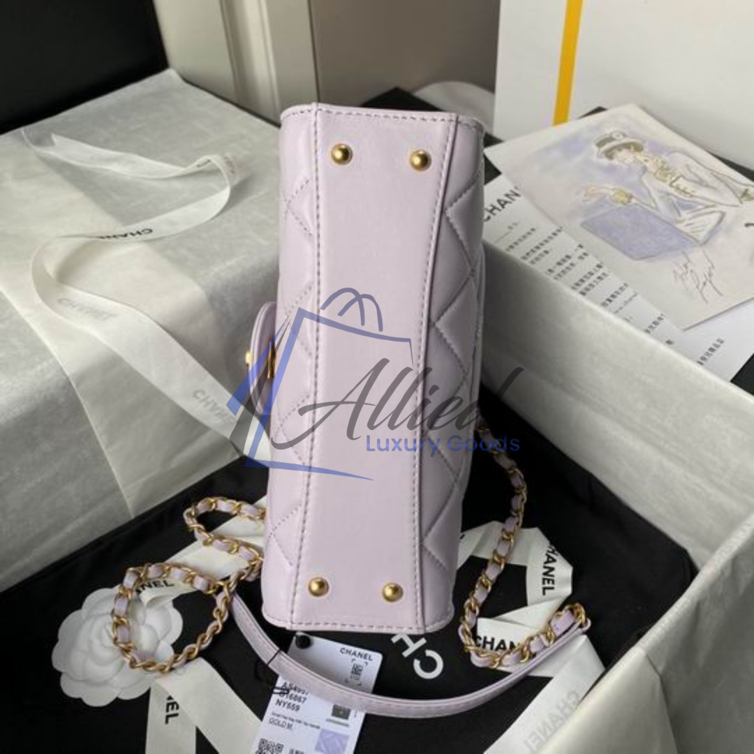 Chanel Maxi Classic Flap Bag with Top Handle | Heirloom Luxury Redefined