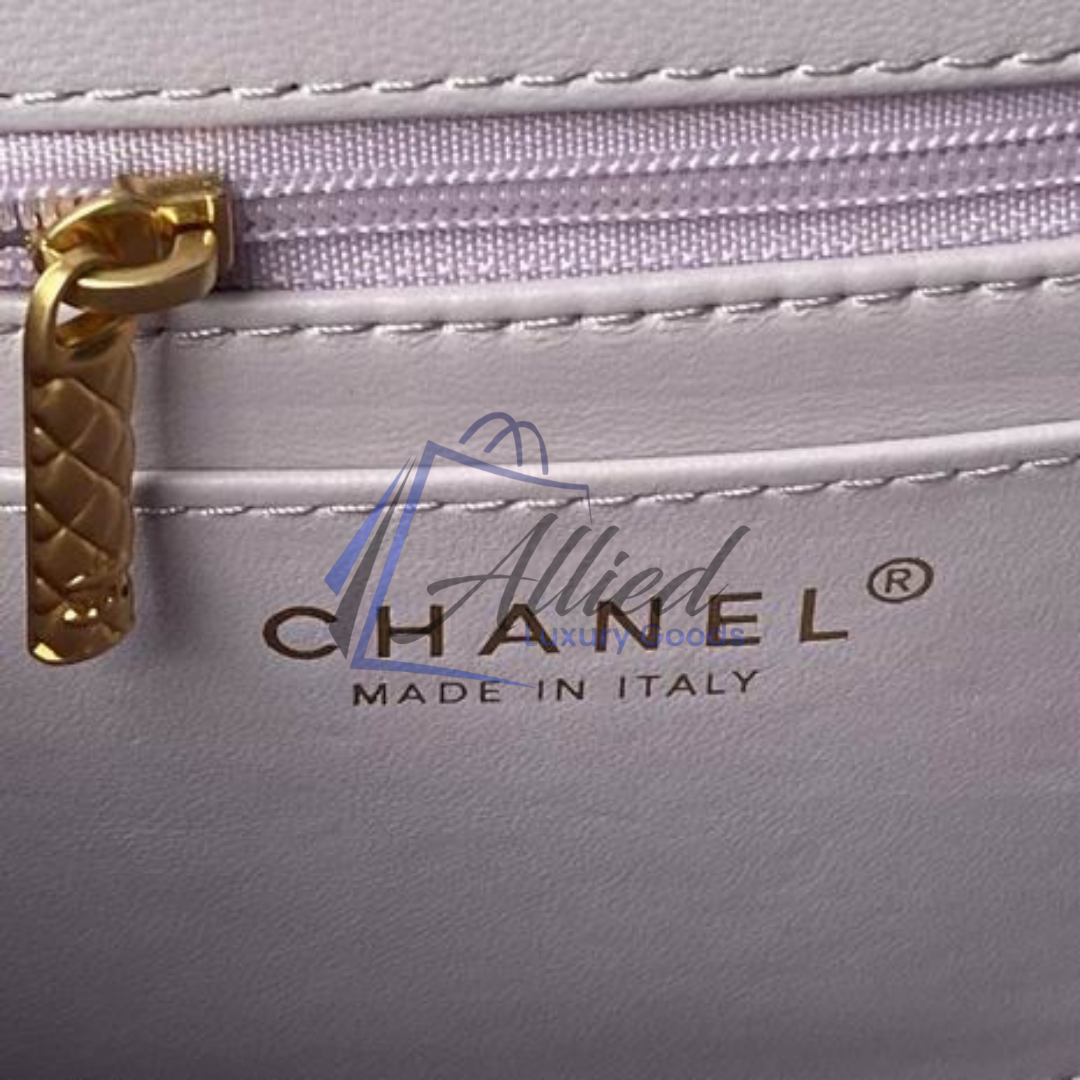 Chanel Maxi Classic Flap Bag with Top Handle | Heirloom Luxury Redefined