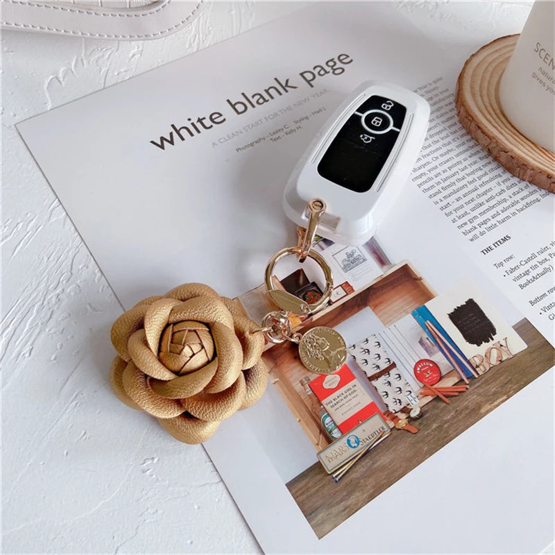 Luxury Black White Camellia Genuine Leather Flower Keychain Letter Umbrella Pendant Car Key Chain Ring Pendant For Bag Accessory