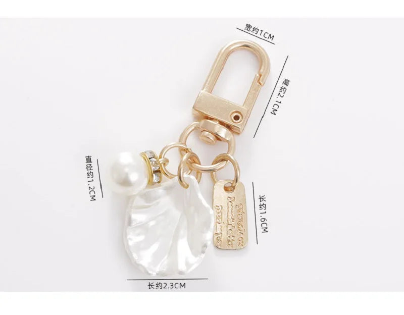 Cute Pearl Keychain Luxury Women Jewelry Shiny Pearl Bead Shell Phone Bag Backpack Charm Accessory Car Key Key Chain Pendant