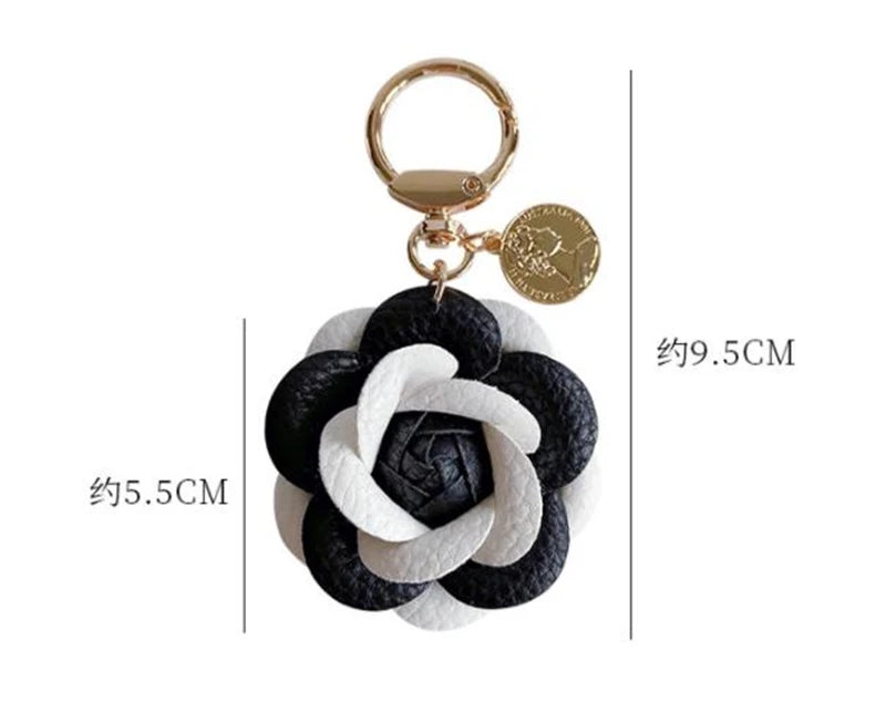 Luxury Black White Camellia Genuine Leather Flower Keychain Letter Umbrella Pendant Car Key Chain Ring Pendant For Bag Accessory