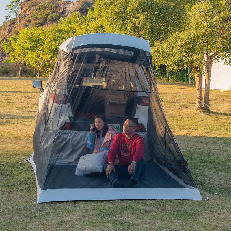 Outdoor camping camping in rear tent Portable double-layer quick-opening tent, full set of large tents at camp side of car.