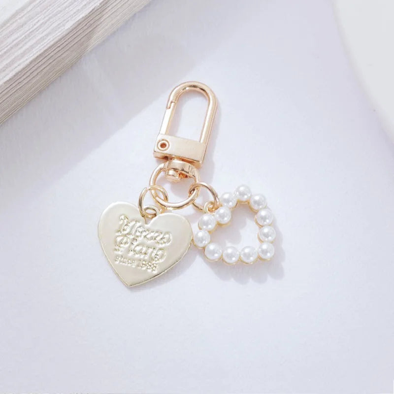 Cute Pearl Keychain Luxury Women Jewelry Shiny Pearl Bead Shell Phone Bag Backpack Charm Accessory Car Key Key Chain Pendant